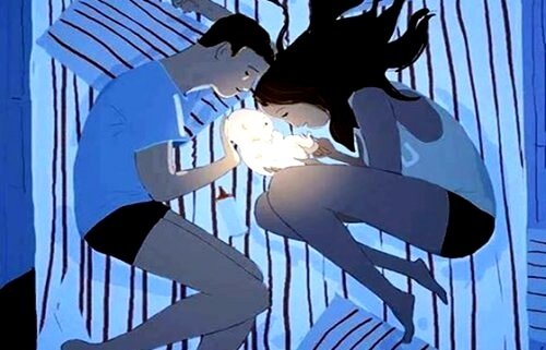 Föräldrar och barn i säng