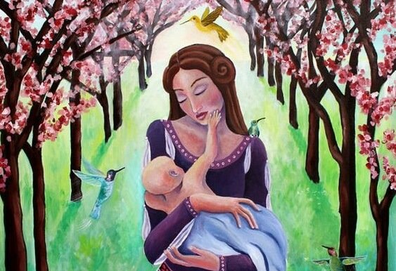 Mamma som håller sitt barn.