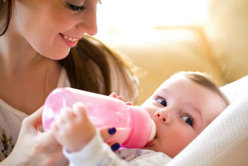 Mamma med bebis.