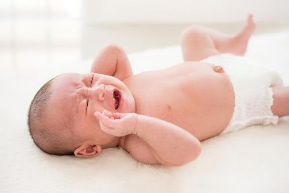 Tricks för att lugna en bebis med kolik