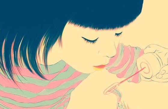 Flicka som blåser såpbubblor.