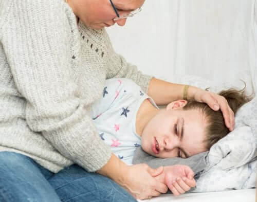 icke-epileptiska paroxysmala anfall: flicka har anfall, mamma hjälper henne