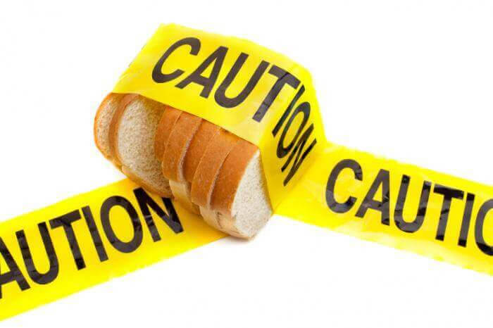 glutenintolerans hos barn: bröd invirat i varningstejp