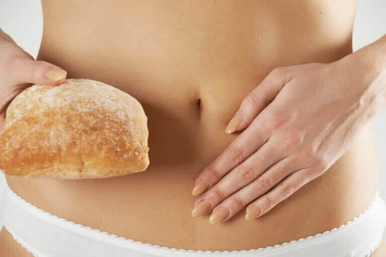 glutenkänslighet som inte är celiaki: kvinnomage med bröd