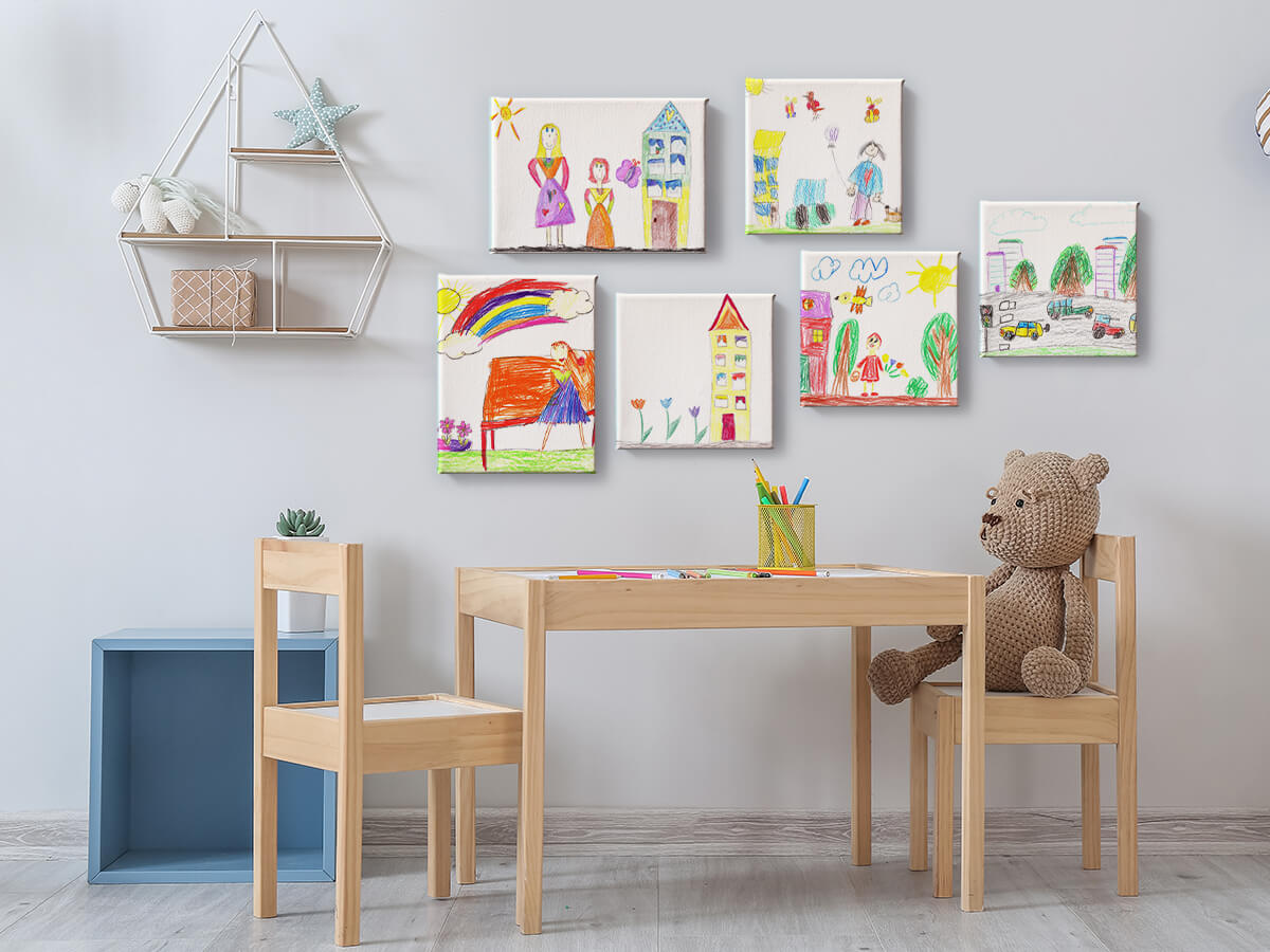 Sätt upp tavlorna på väggen och så att de blir en central punkt i barnens rum.